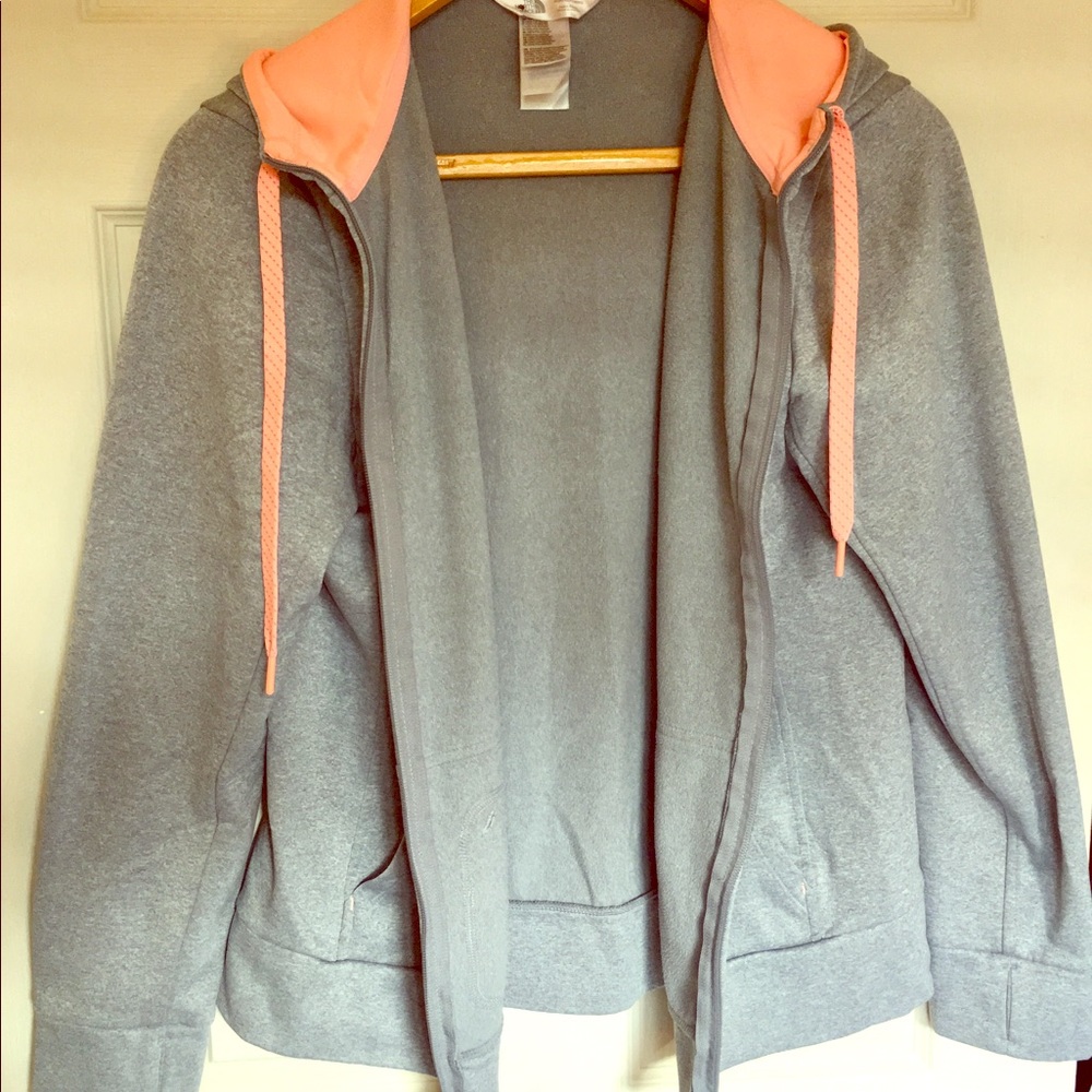 North face zip up hoodie. Pink and grey.